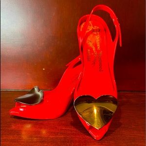 Vivienne Westwood Melissa red rubber shoes with  heart. Size 9